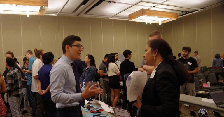 Students Present Their Business Plan to a Business Professor