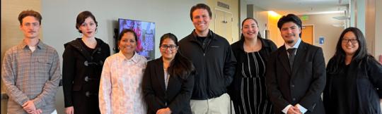 Sonoma State University Faculty Member Dr. Naga Damaraju Stands with Students